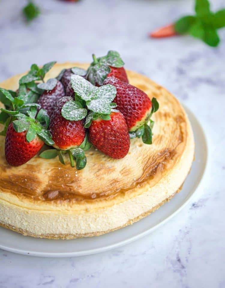 a cheesecake with berries on top