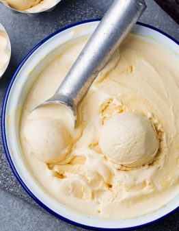 ice cream scoop in a bowl of ice cream