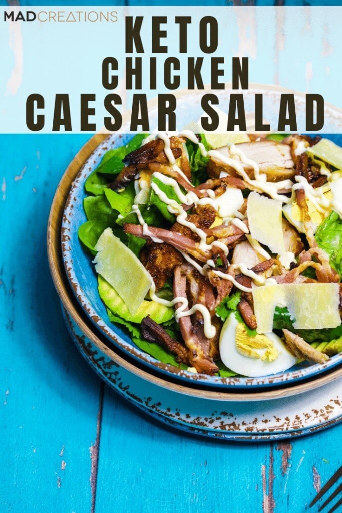 Chicken Caesar in a bowl on a blue table