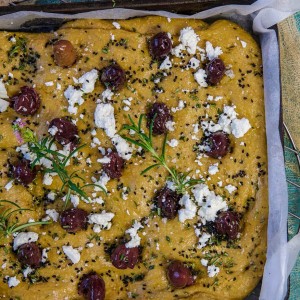 focaccia with olives in pan