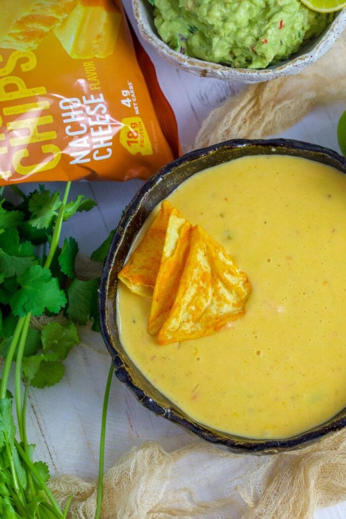 Cheese Dip in a bowl with coriander and protein chips