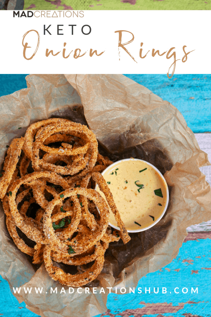 Mad Creations Onion Rings in a bowl with dressing