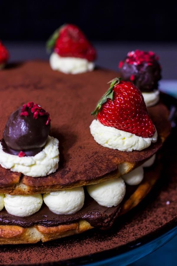 Tiramisu chocolate cake with strawberries on top