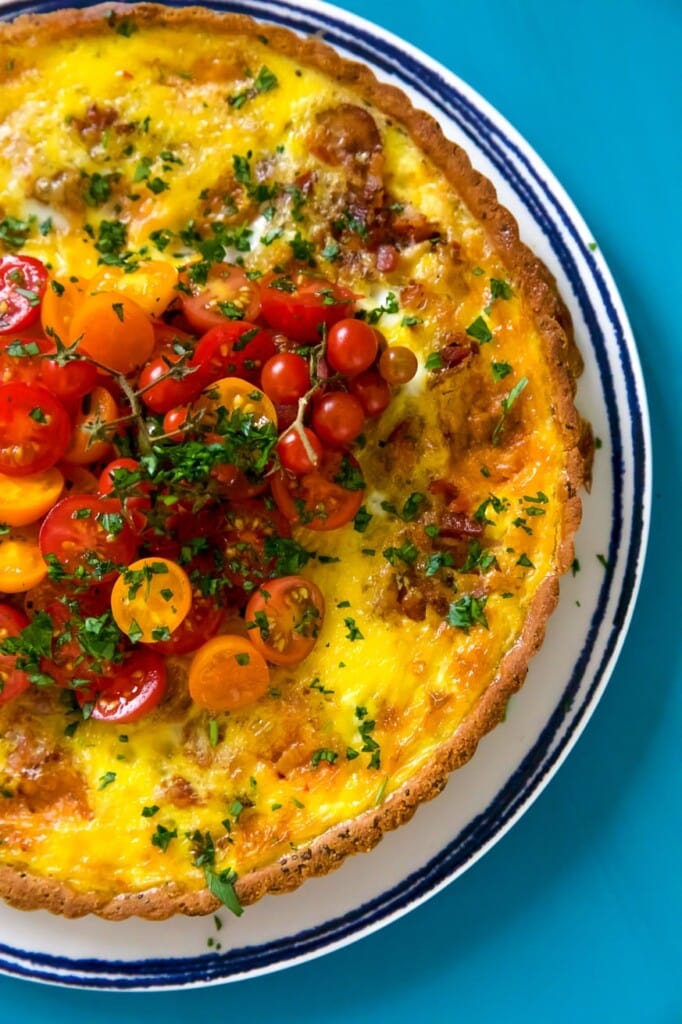 onion tart with tomatoes on the top