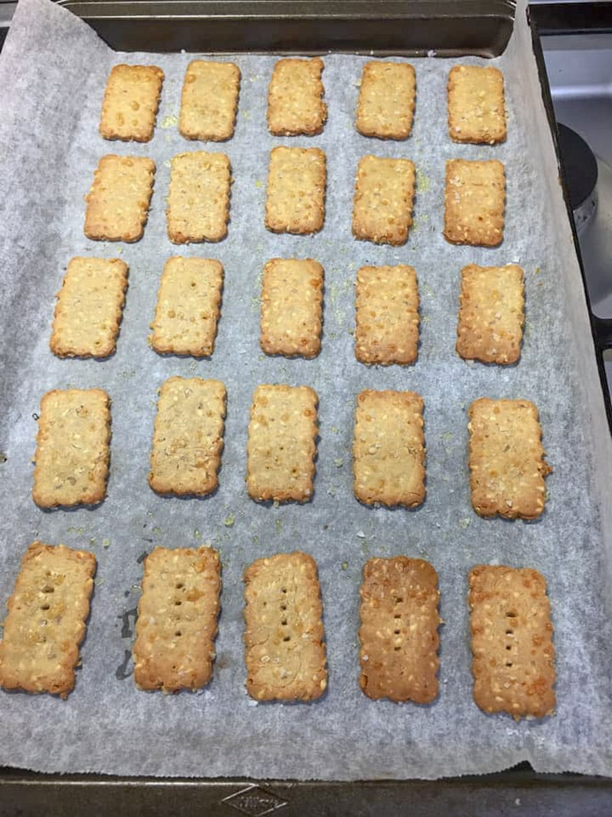 baked keto sesame crackers on baking tray