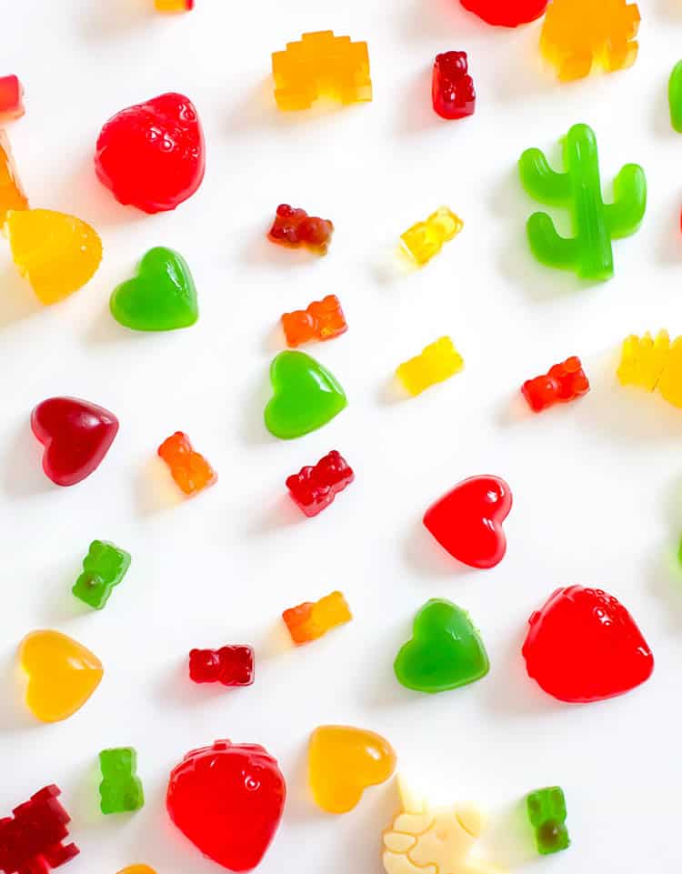 Sugar Free Gummies of all colours on white table