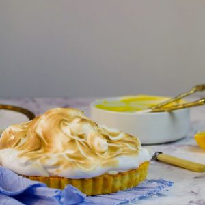 lemon meringue pie on marble countertop