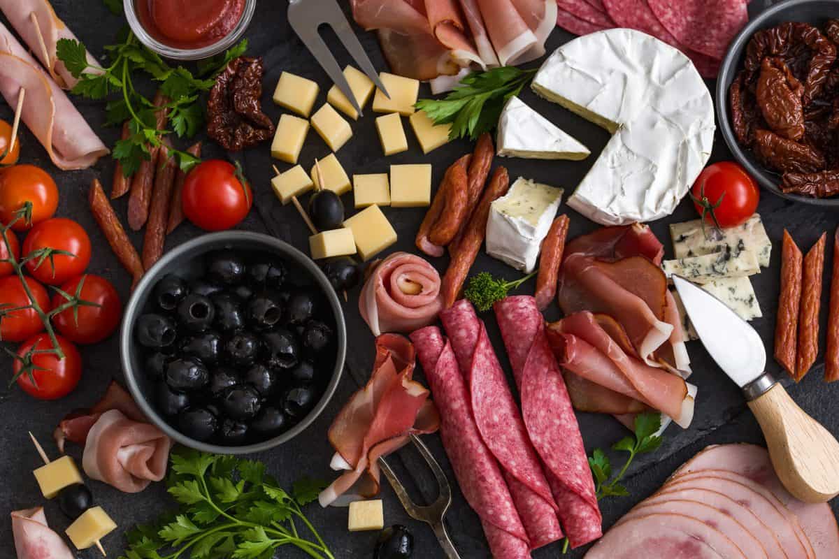 anitpasta platter with cheese, meats and olives
