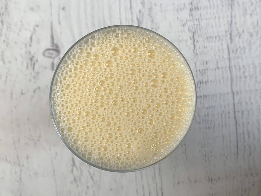 close up of an egg shake on a white background