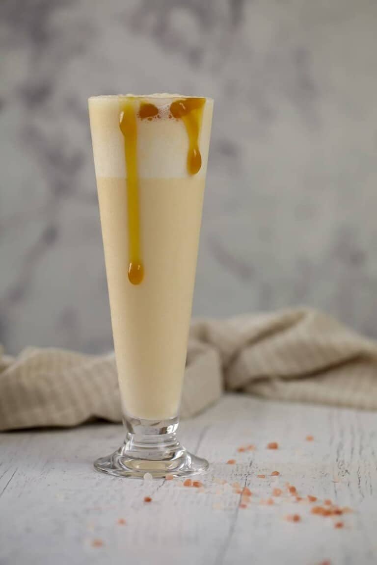 Shake in a large glass with caramel dripping down the sides