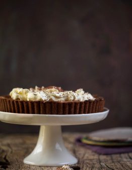 chocolate pie on a white cakes stand