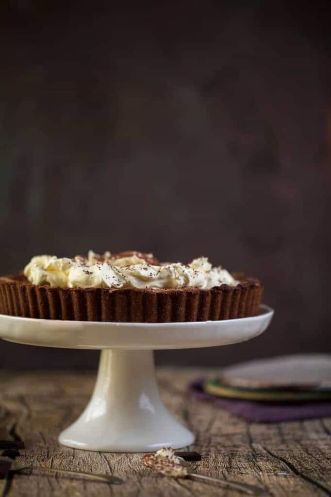 chocolate pie on a white cakes stand