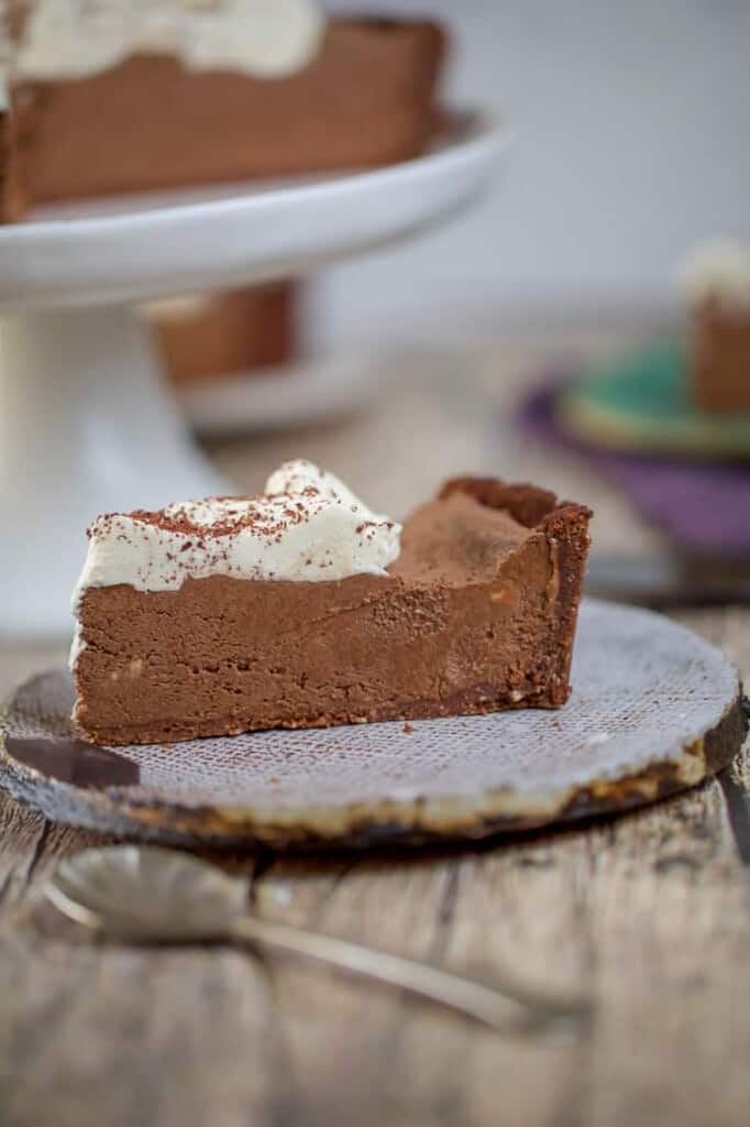 Slice of chocolate pie on a brown plate