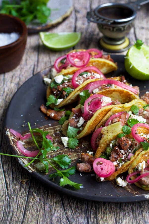 mini tacos on a brown plate