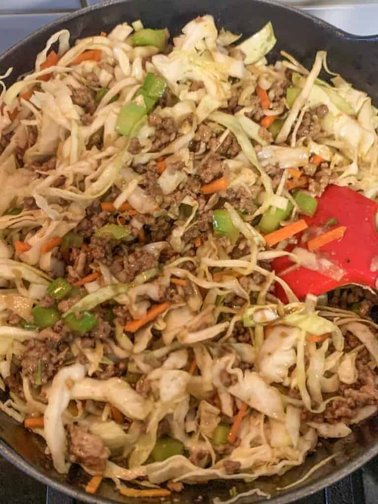 egg roll in bowl in a pan