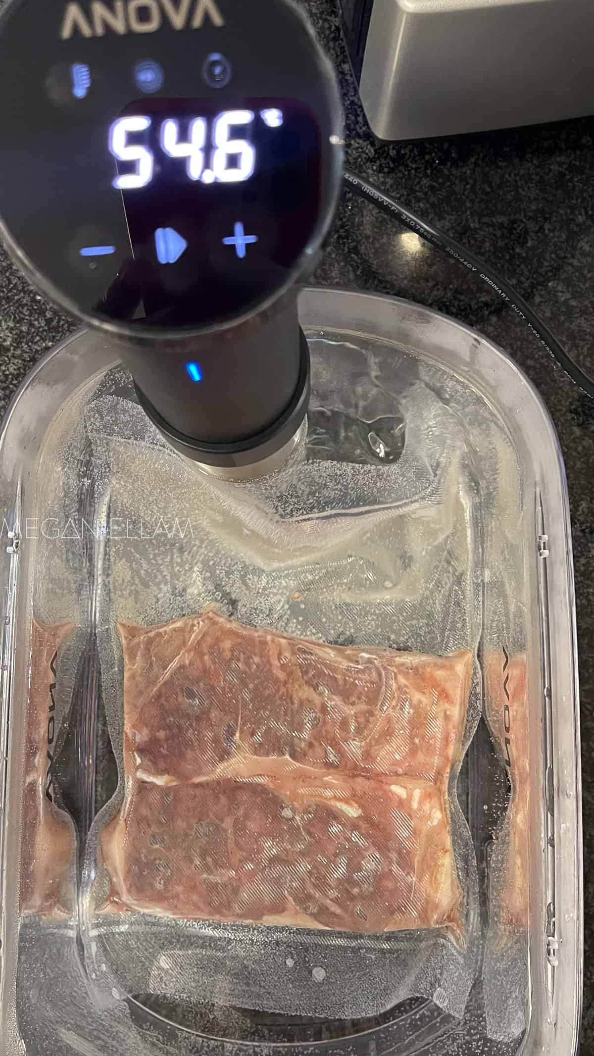 cooked steak in a water bath.