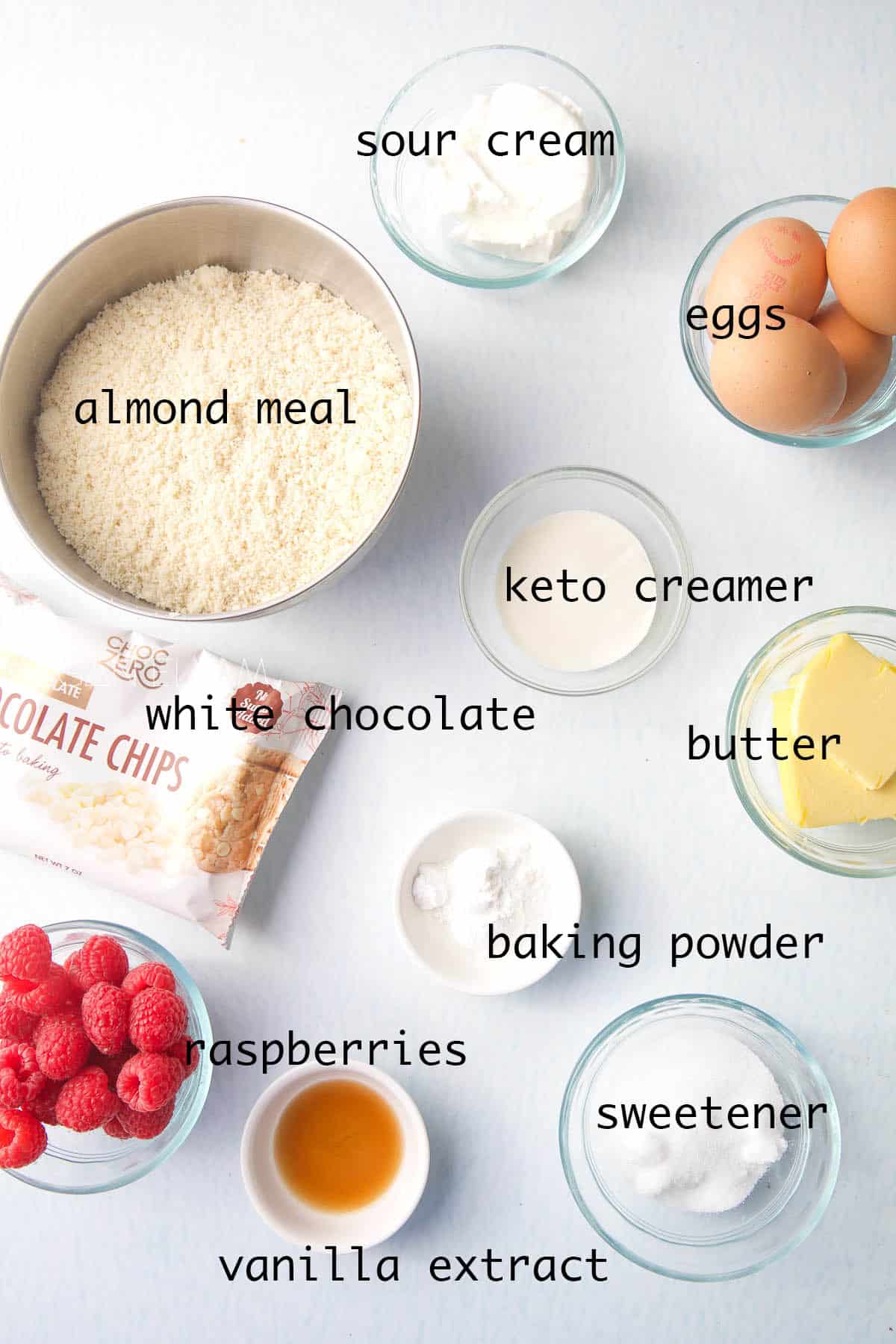 Keto Raspberry Muffins ingredients in small bowls