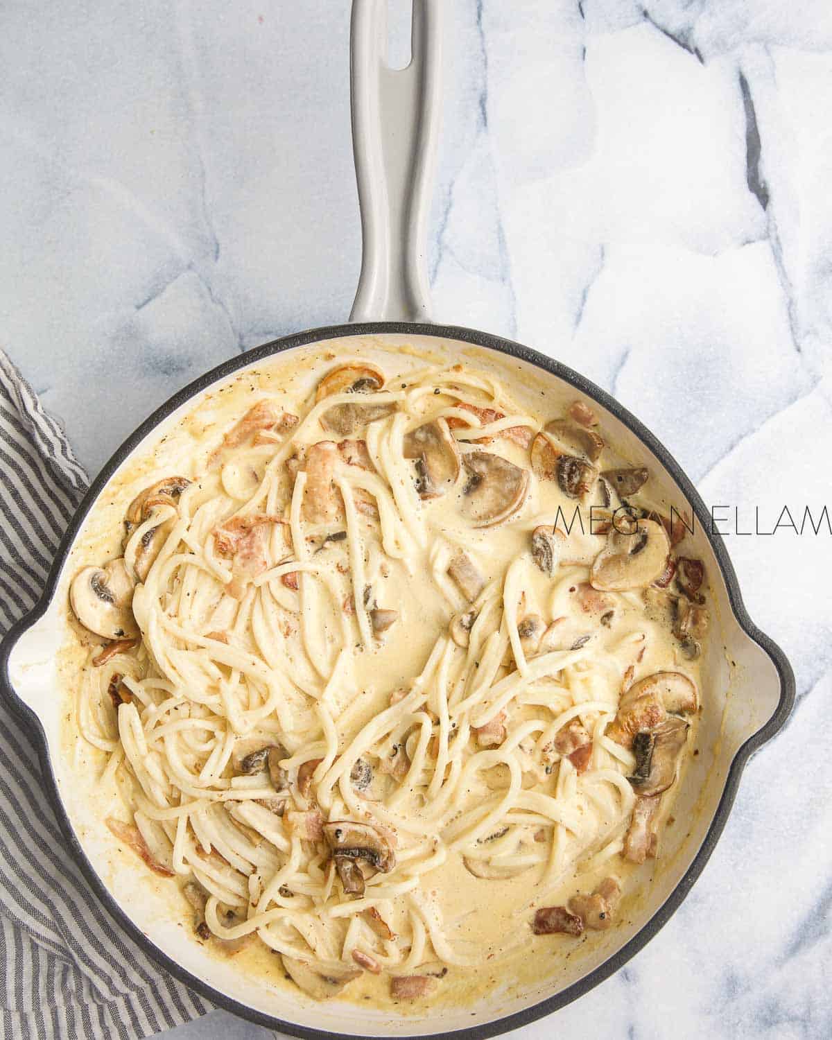 Keto Pasta in a skillet with mushrooms.