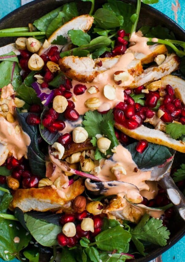 Chicken with pomegranate seeds.