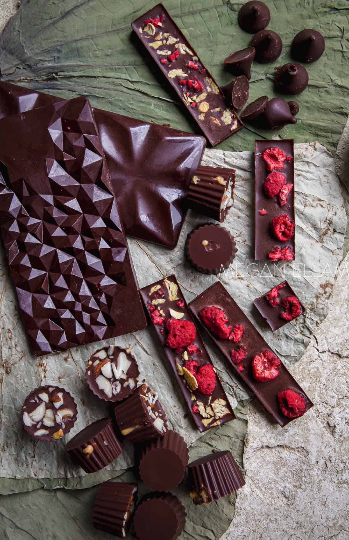 A range of chocolates on a natural fauna background.