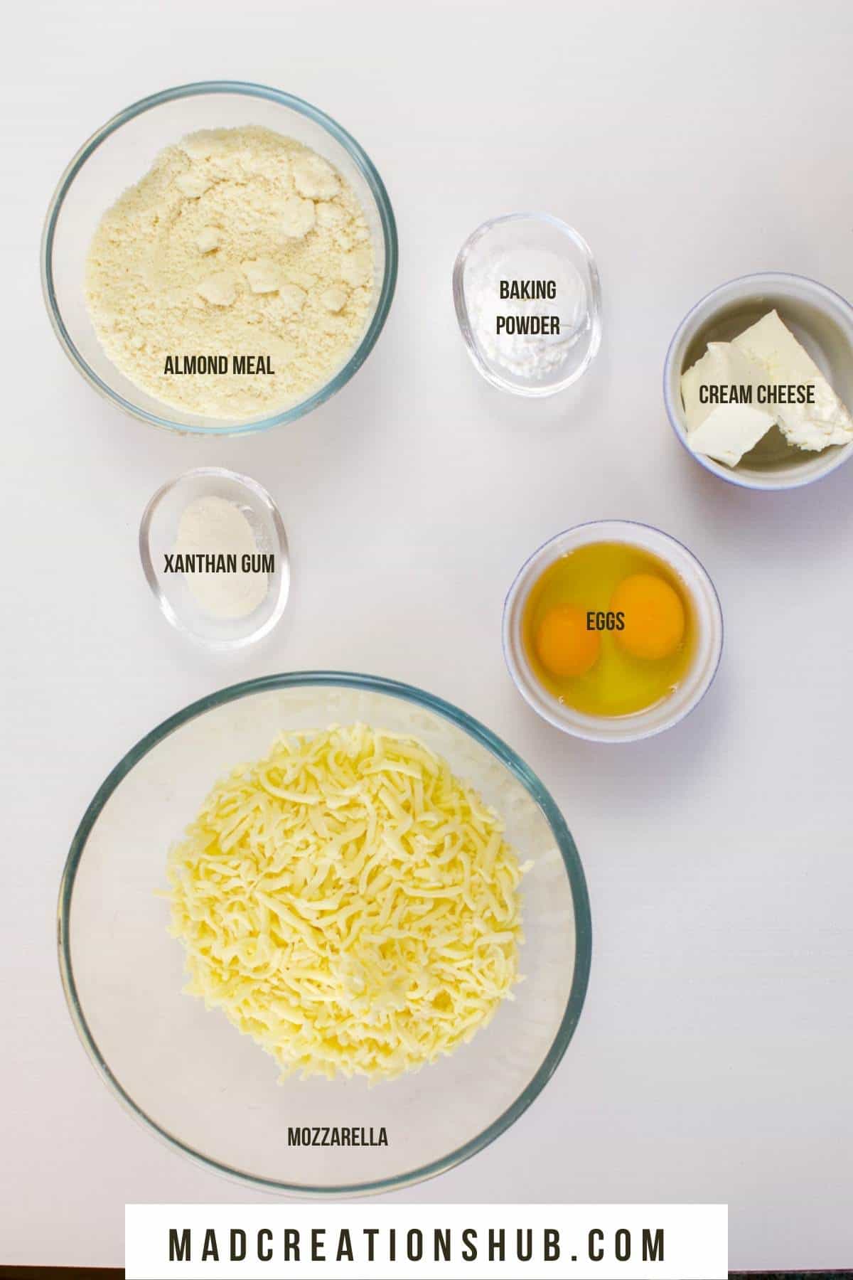 Fathead Pizza Crust Ingredients in bowls on a white background.