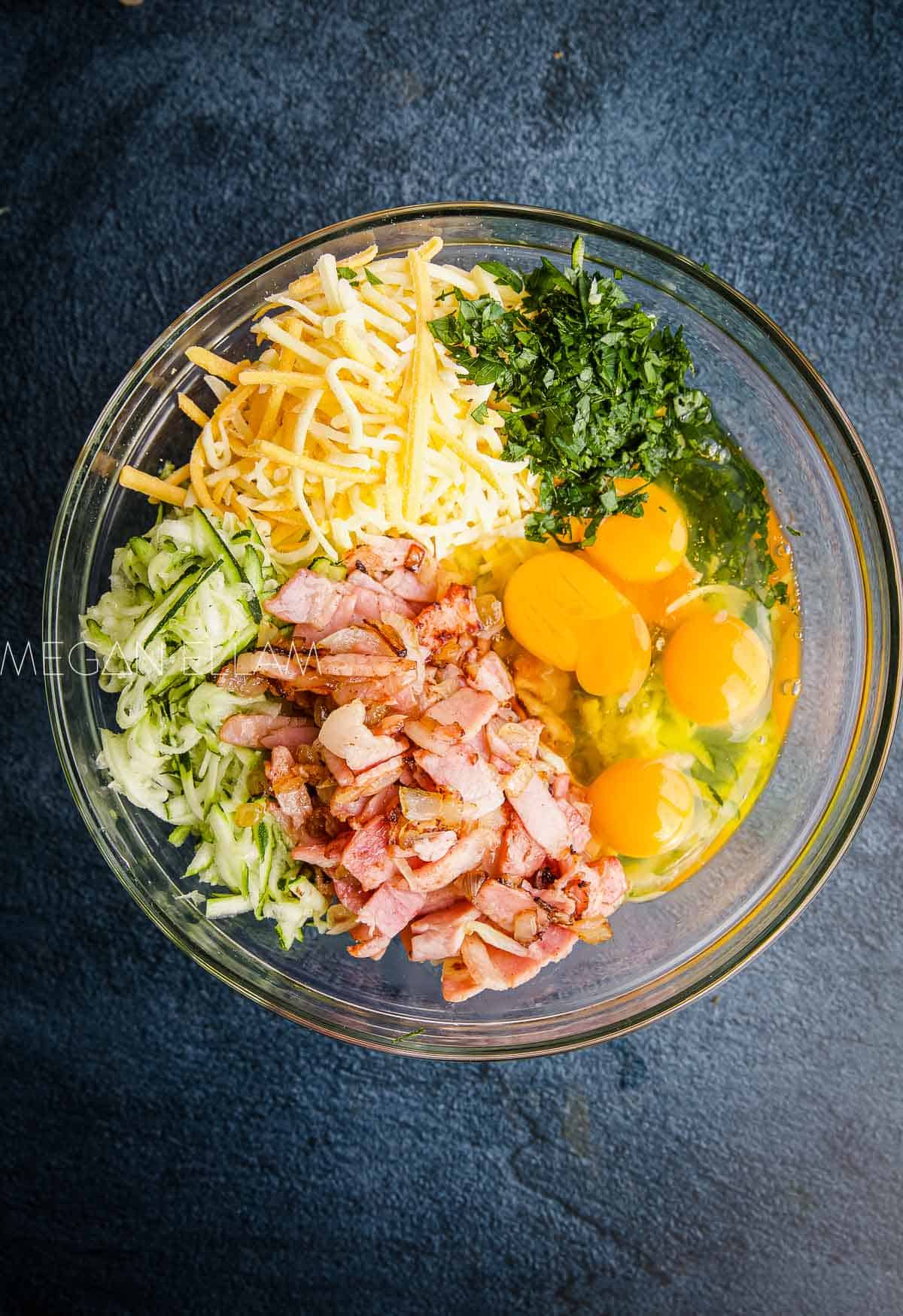 Bacon Quiche ingredients all in a glass bowl.