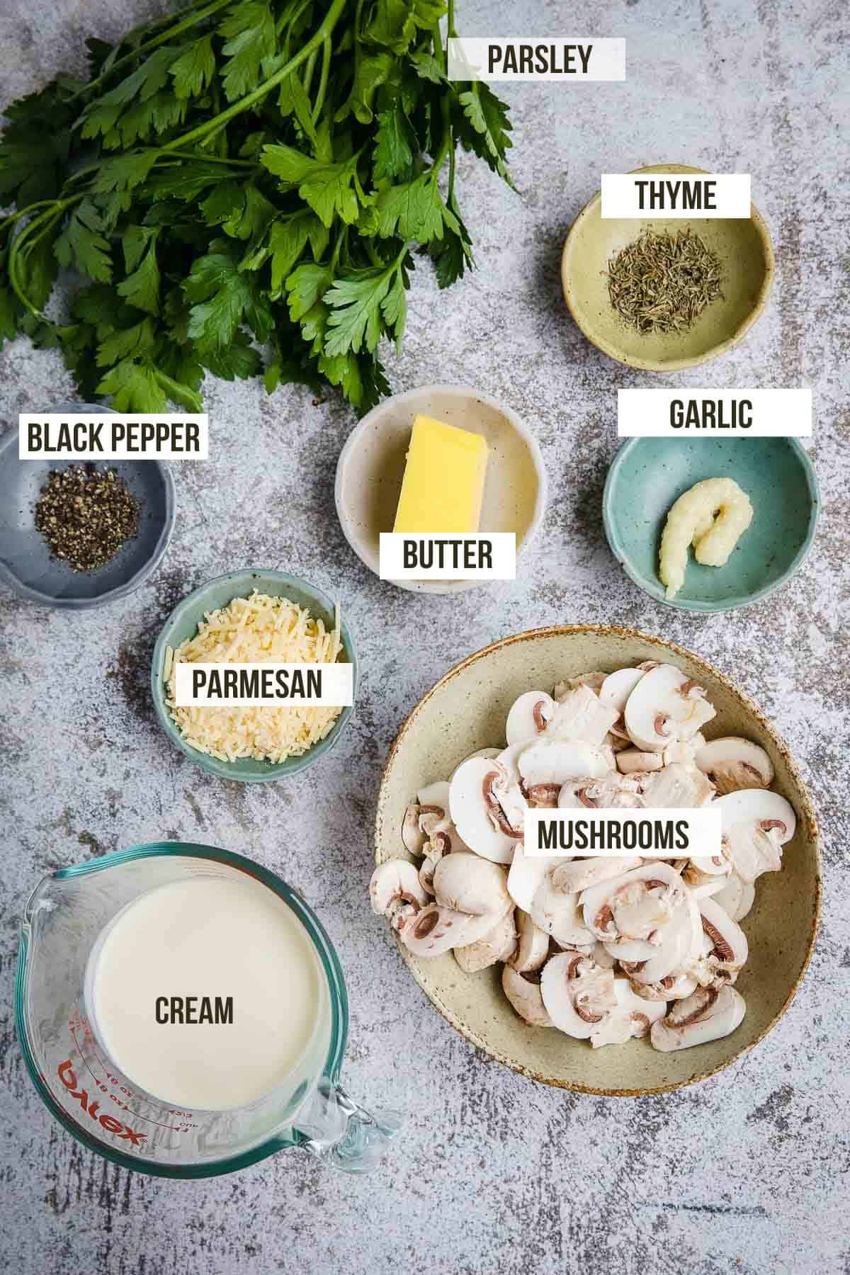 Keto Mushroom Sauce ingredients in small bowls with labels so you know what is in the sauce.