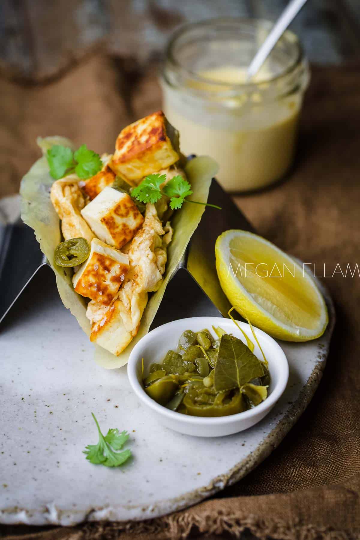 A soft cheese taco filled with eggs and haloumi.