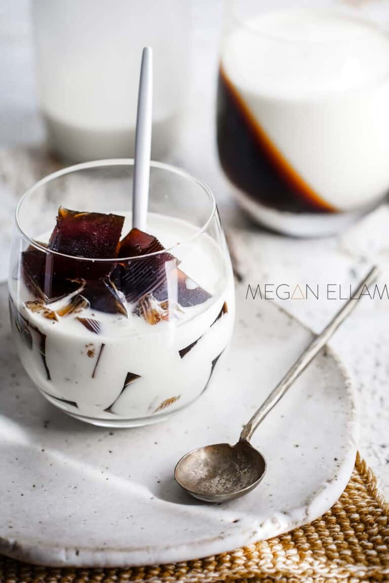 Coffee jellies in a glass of milk.