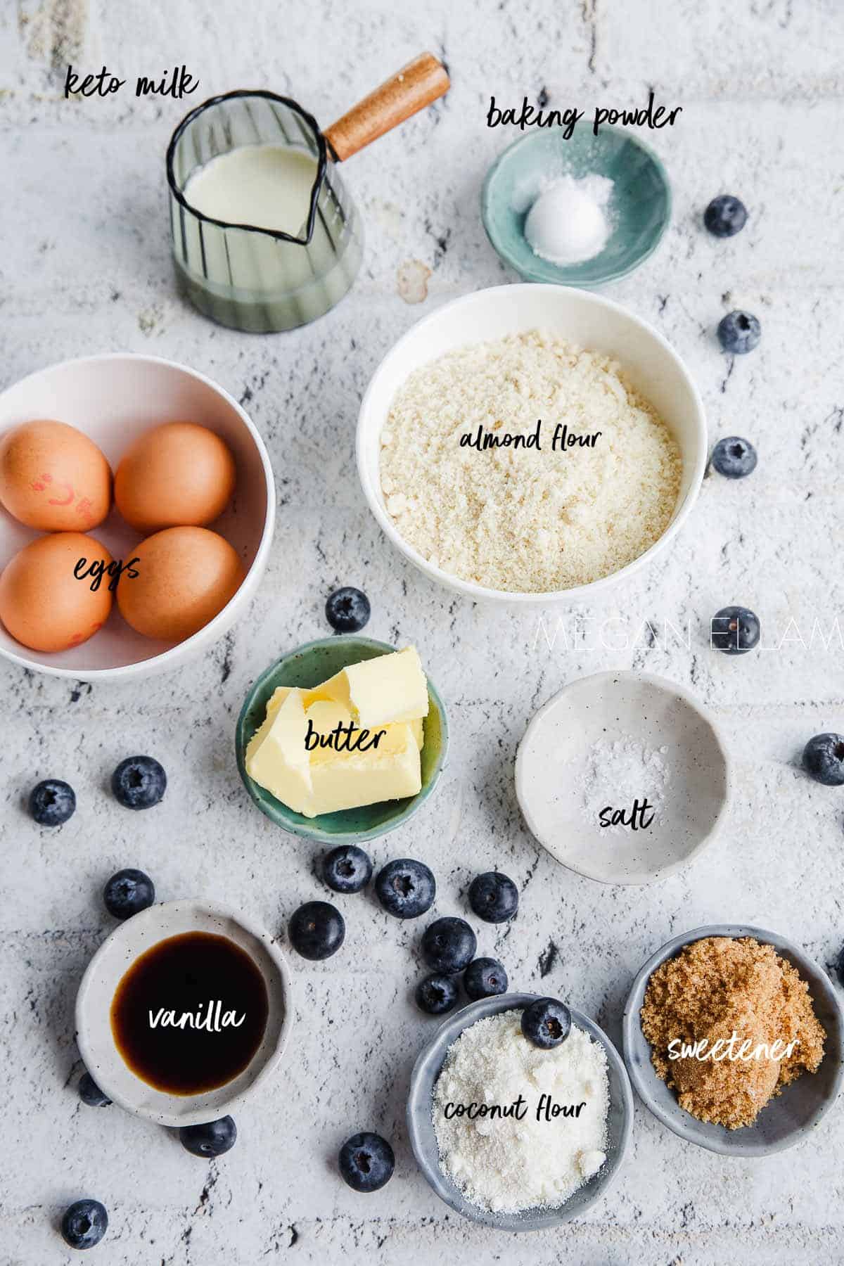 Keto Pancakes ingredients laid out in bowls with labels of what they are.