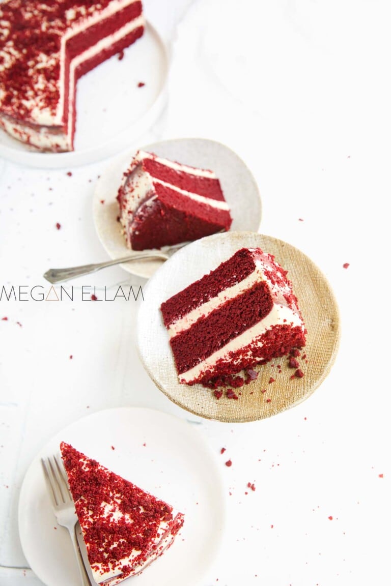 Slices of Keto Red Velvet Cake on plates.